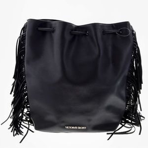 Victoria’s Secret black vegan leather backpack w/fringe. Drawstring closure. EUC